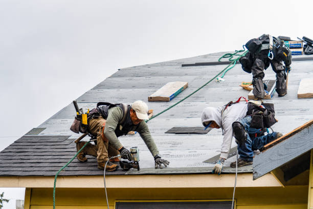 Professional Gutter Installation technician working in Marengo, IA